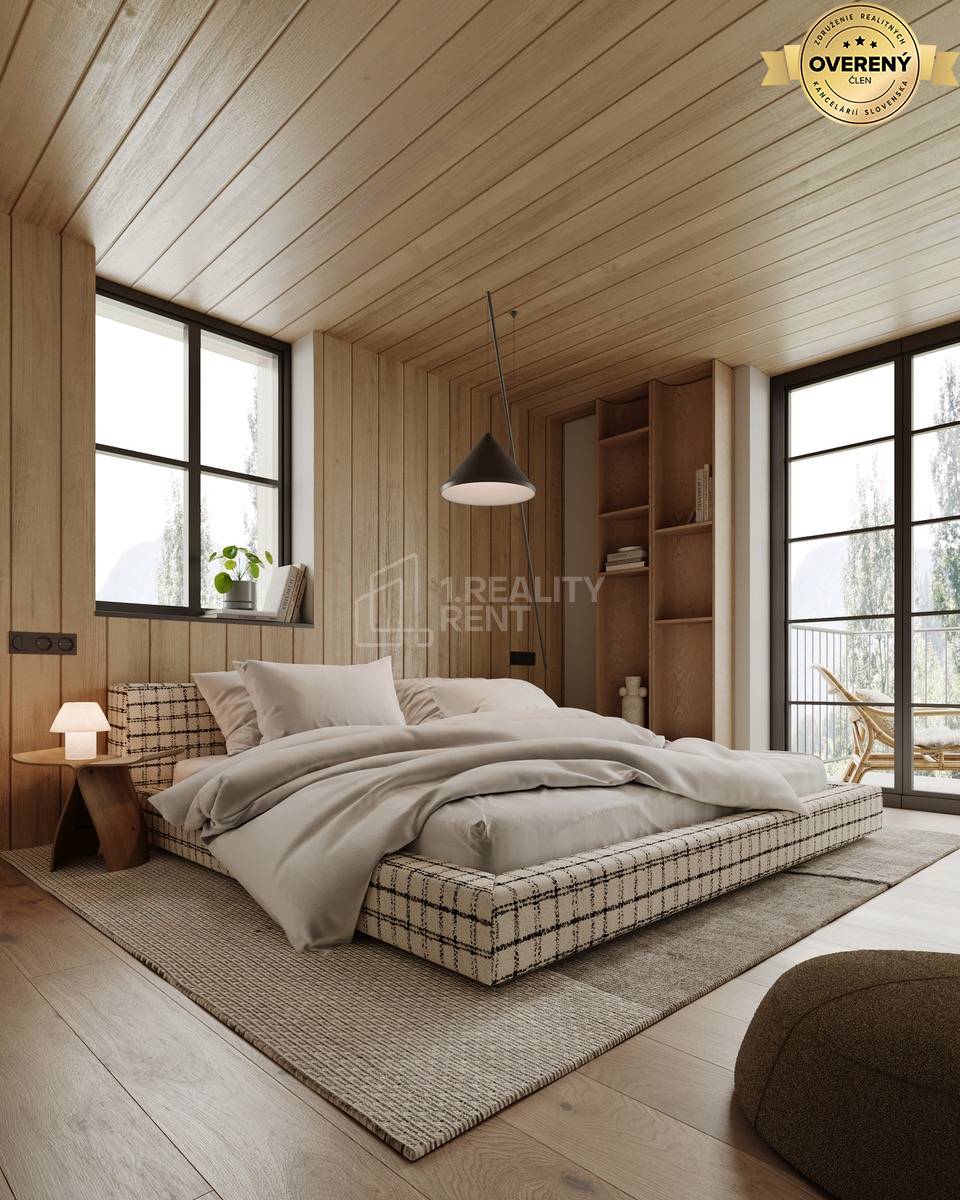 Spálňa v Rekreačnom apartmáne s podlahou s dreveným dekorom a pohodlnou posteľou.